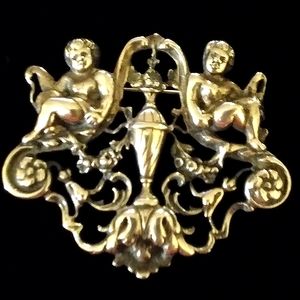 Old Cini Cherub and Vase Brooch